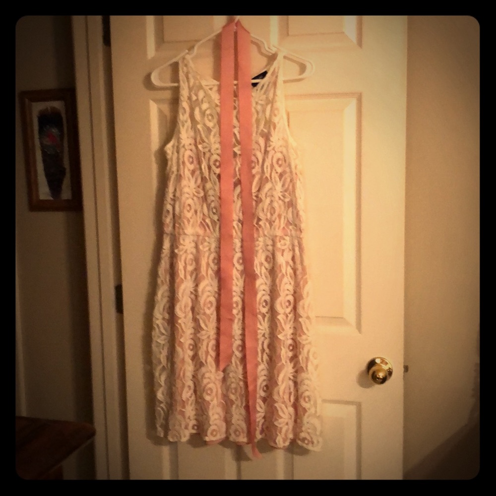 Beautiful lace dress with blush slip and waist tie